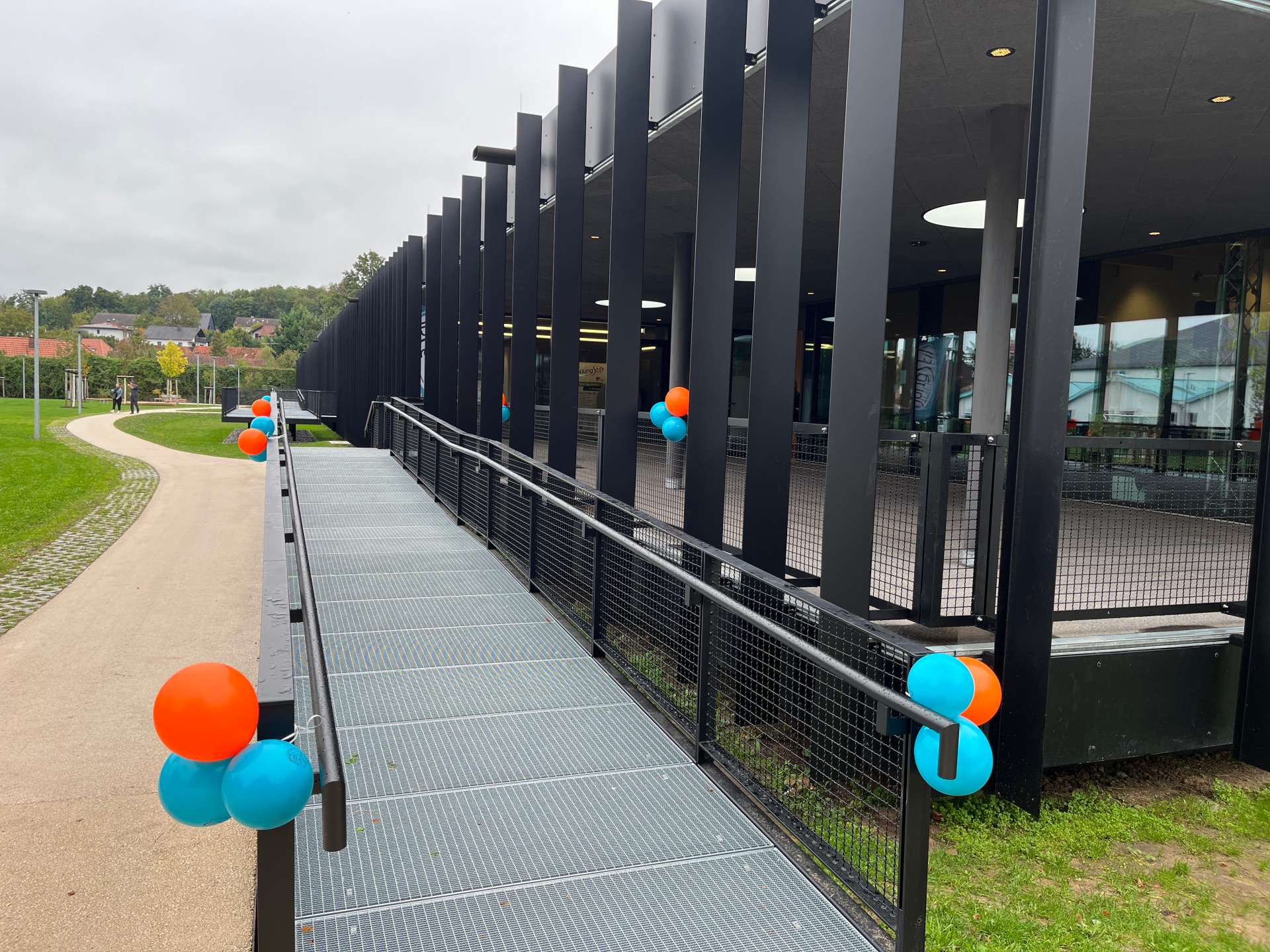 The entrance to the House for Youth and Family is decorated with colourful balloons for the inauguration.
