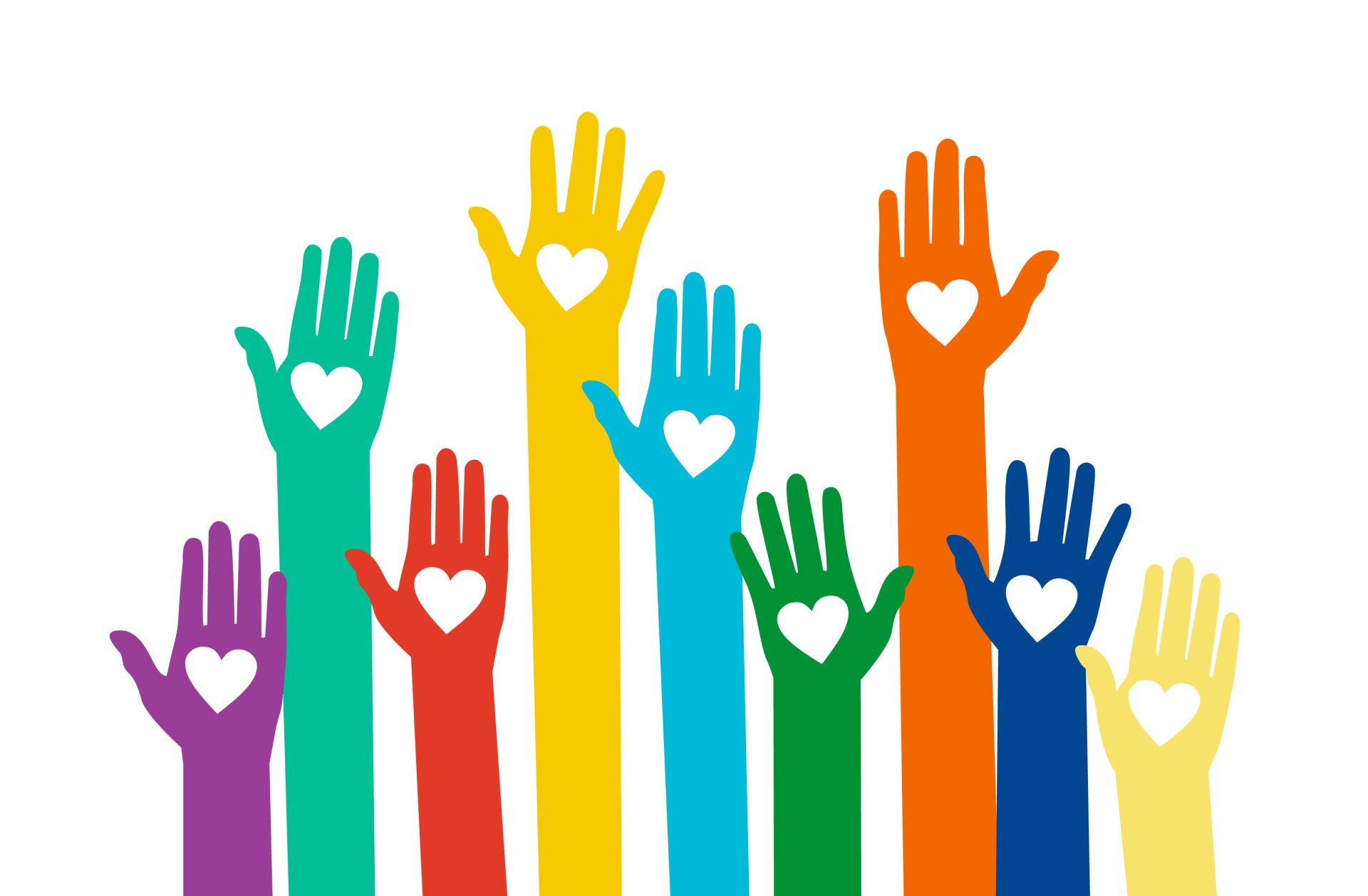 Gehobene verschieden farbige Hände mit weißen Herzen in der Handfläche.