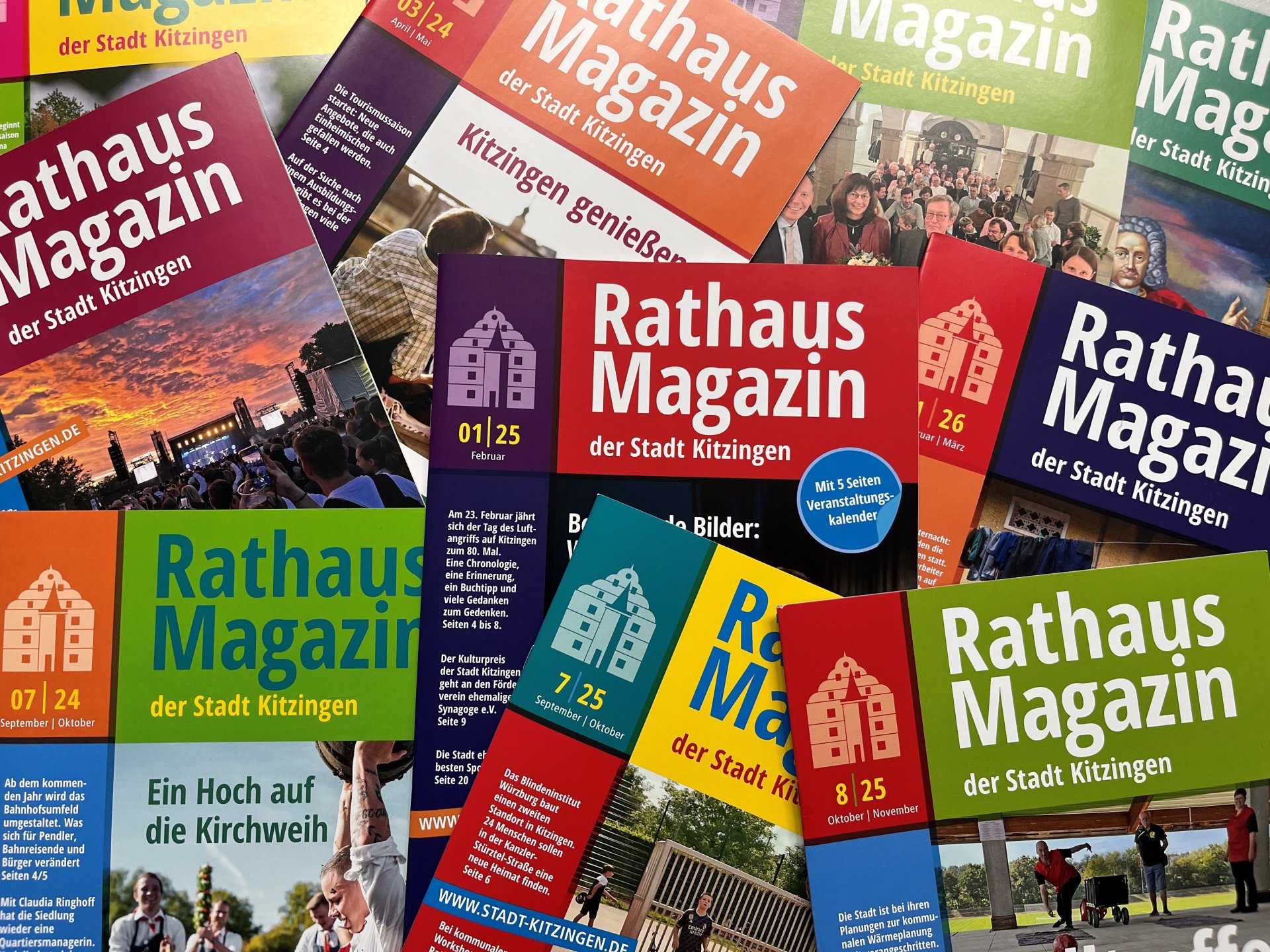 Several town hall magazines next to each other.