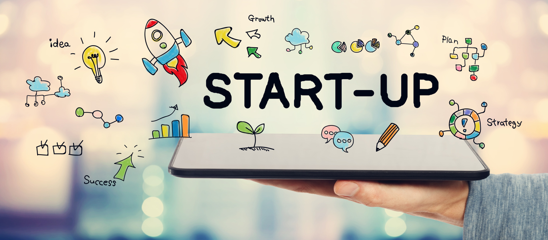 Start-Up Konzept Start-up-Konzept mit einem Mann, der einen Tablet-Computer hält